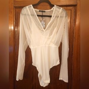 Sexy white bodysuit NWT satin vneck with mesh overlay and long sleeves